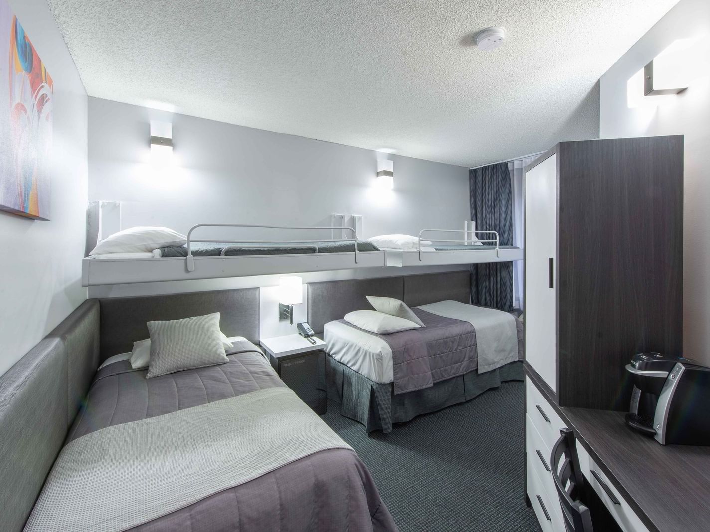 2 Single beds & 2 bunk beds in Quadruple Room at Travelodge Montreal Centre