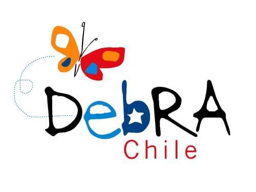 The logo of Debra Chile foundation at Hotel Torremayor Lyon