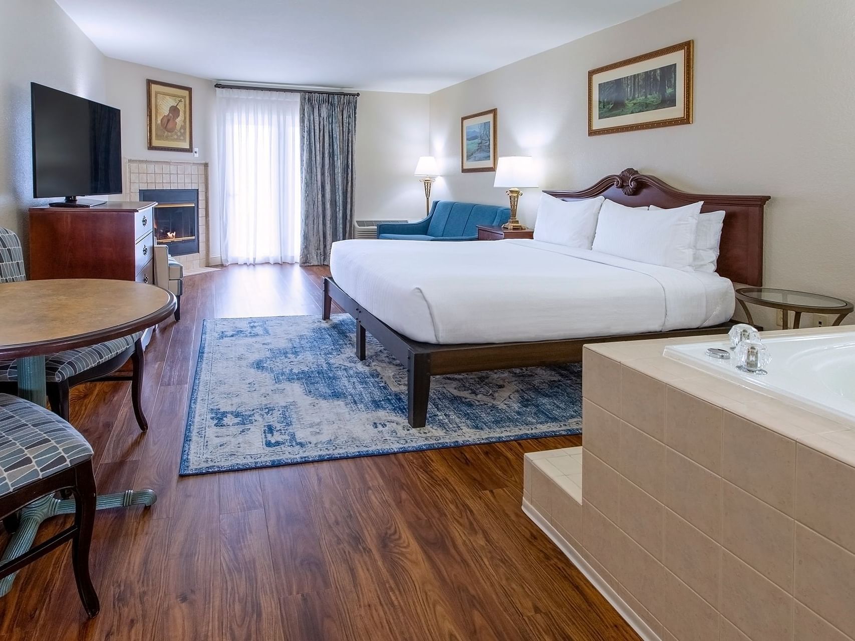 Bedroom arrangement in The Premier King at Music Road Resort Inn