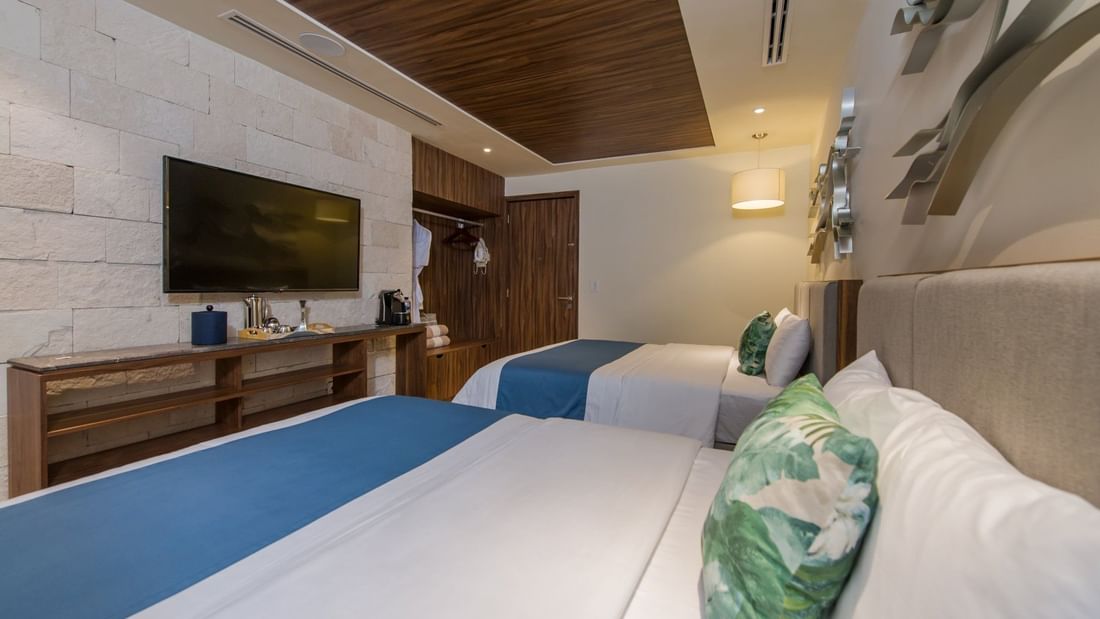 2 Double beds in Luxury room at Naay Tulum Curamoria collection