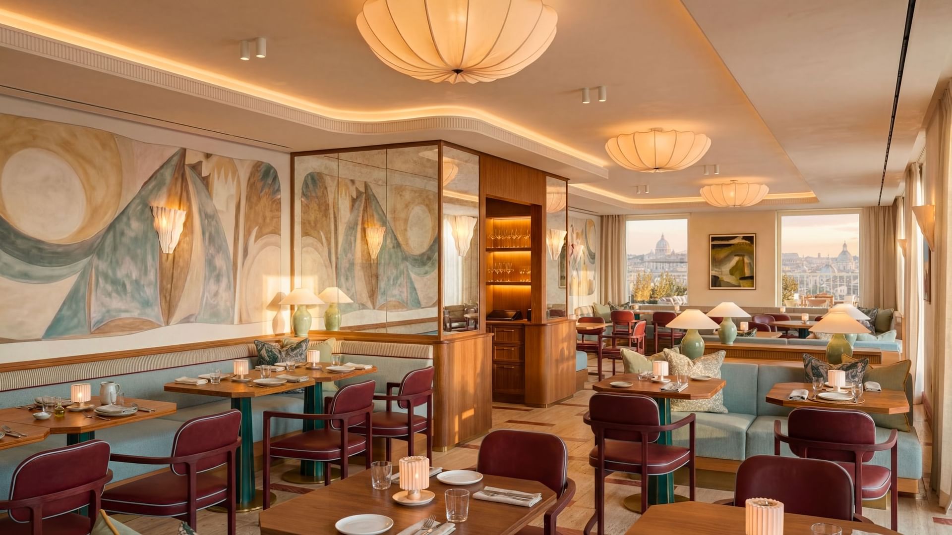 Wooden dining tables and leather chairs in Lyve Restaurant with a large window facing the skyline view at Thompson Rome