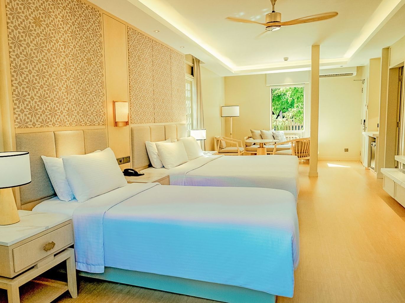 Twin beds & lounge in Family Room at Pelangi Beach Resort & Spa