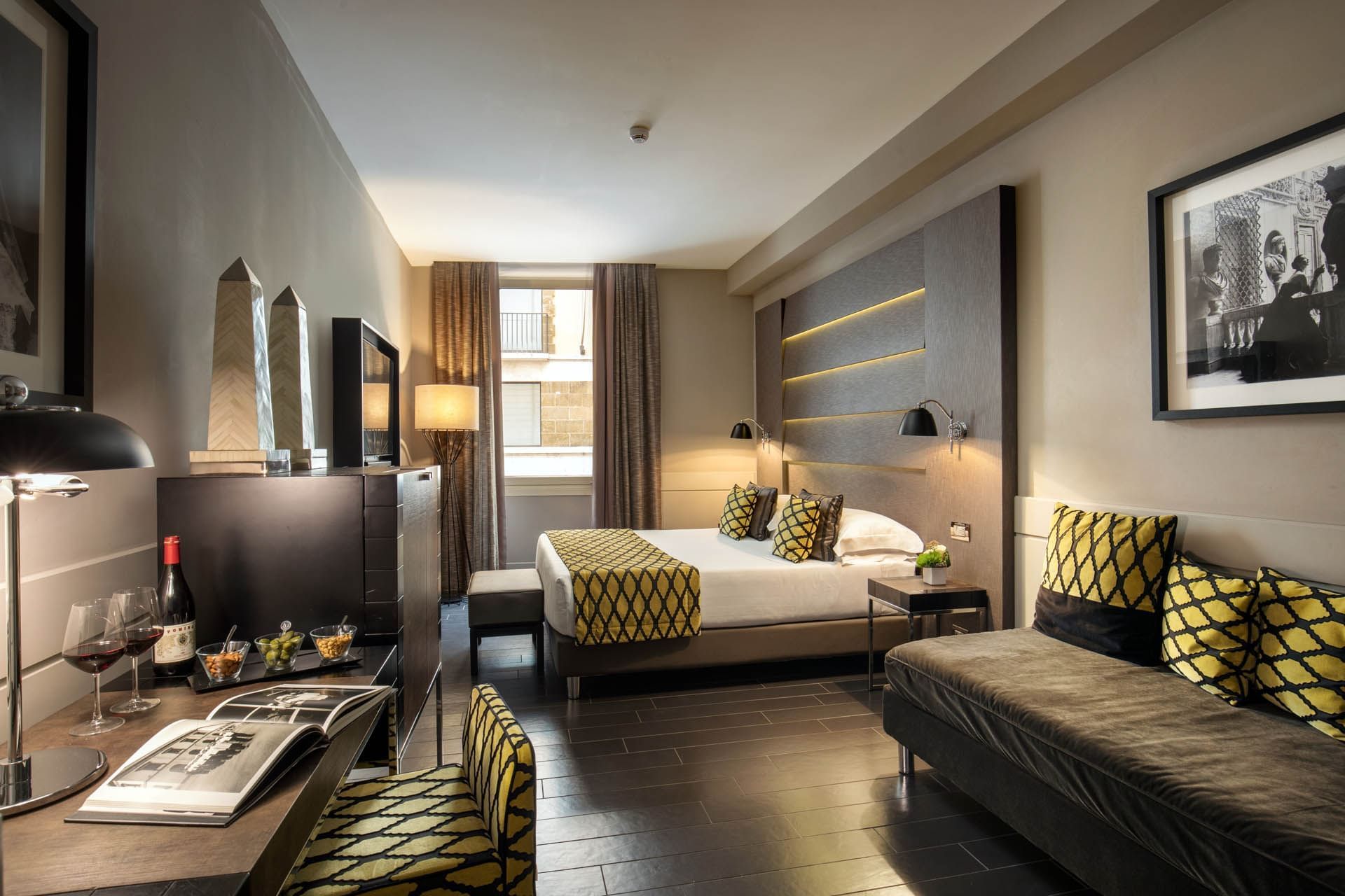 Deluxe Room with a luxury interior featuring the modern furniture and warm ambience at The Style