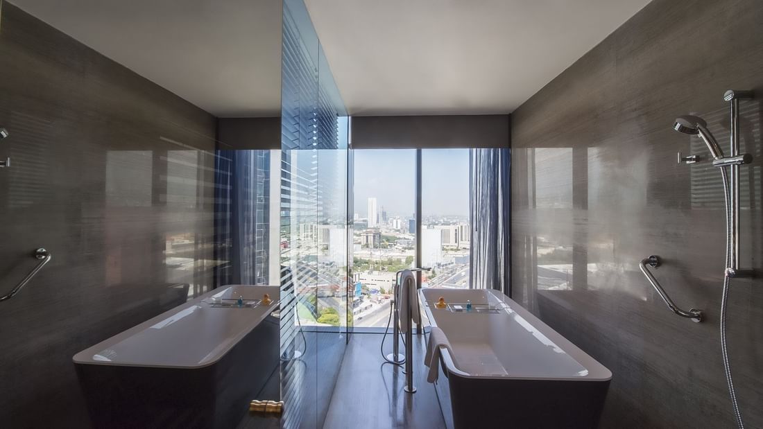 Bath tub with City view in Deluxe Room at Live Aqua resort