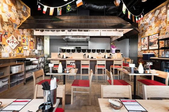 Tables arranged with bowls & sauces in Ramen Keisuke at Melbourne Hotel Perth