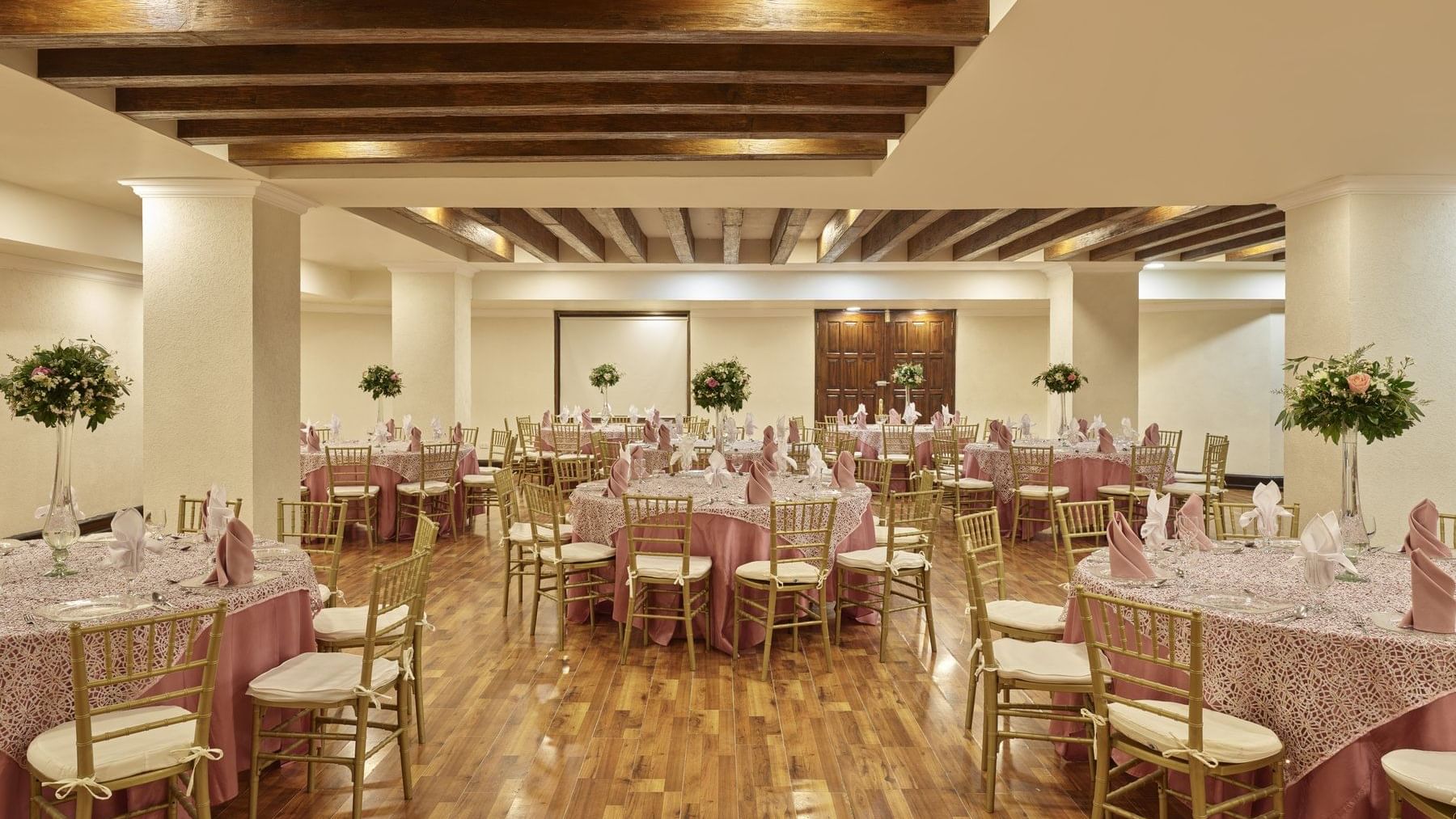 Banquet tables arranged in Fiesta salon at FA Aguascalientes