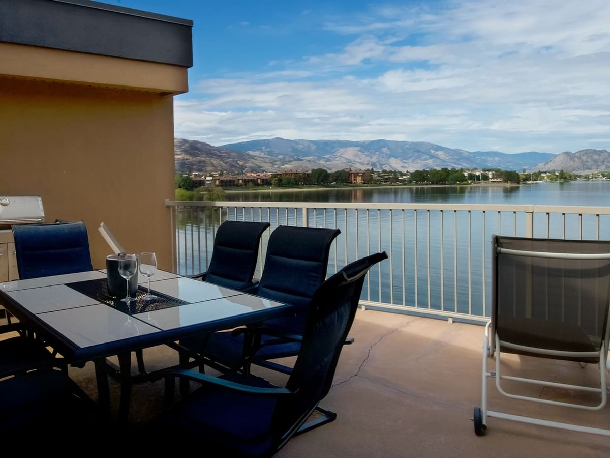 Grill with lake view and chairs to chill