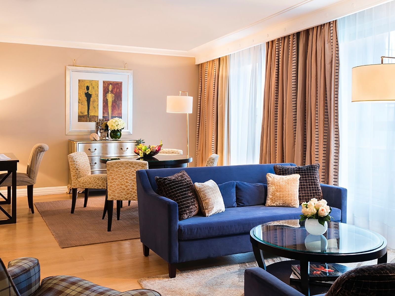 Living room with sofas & tables at Warwick Paris Champs Elysées