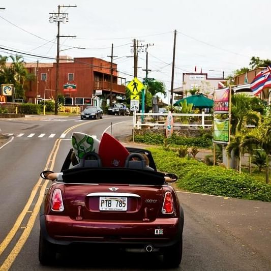 Landscape view of the busy street on a sunny day near Waikiki Resort Hotel by Sono