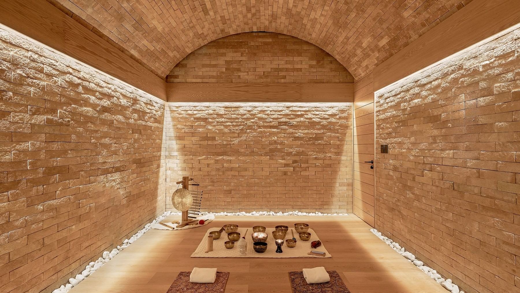 Interior of a Spa Room with stone floor and wooden walls at Grand Fiesta Americana