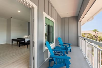 Double Queen with Balcony sitting area, overlooking a serene view at The J Hotel, Dunedin, FL