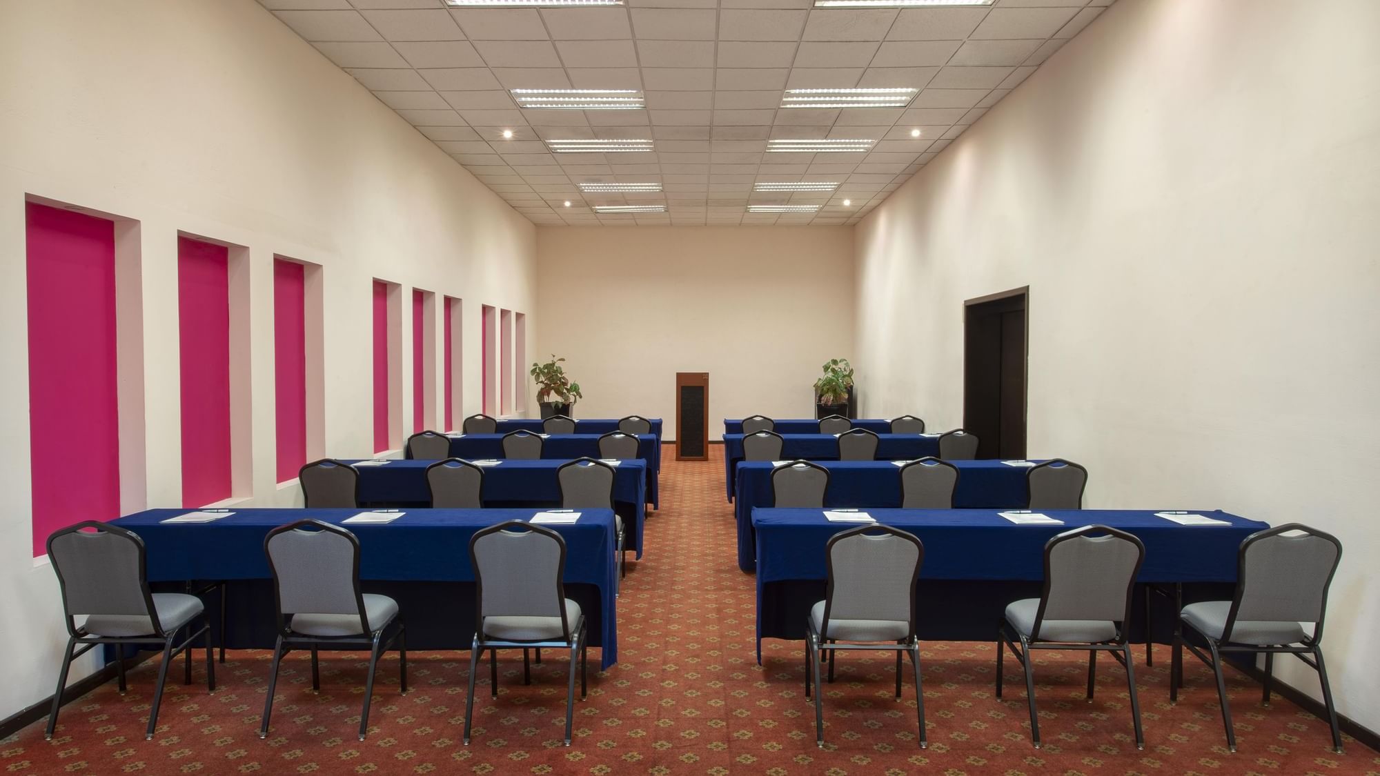 Meeting room with theater set-up at Gamma Hotels