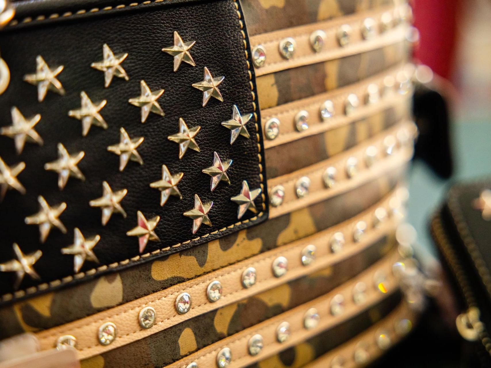 Close-up of a leather handbag with gold hardware at Old Fields Country Store near South Branch Inn Moorefield