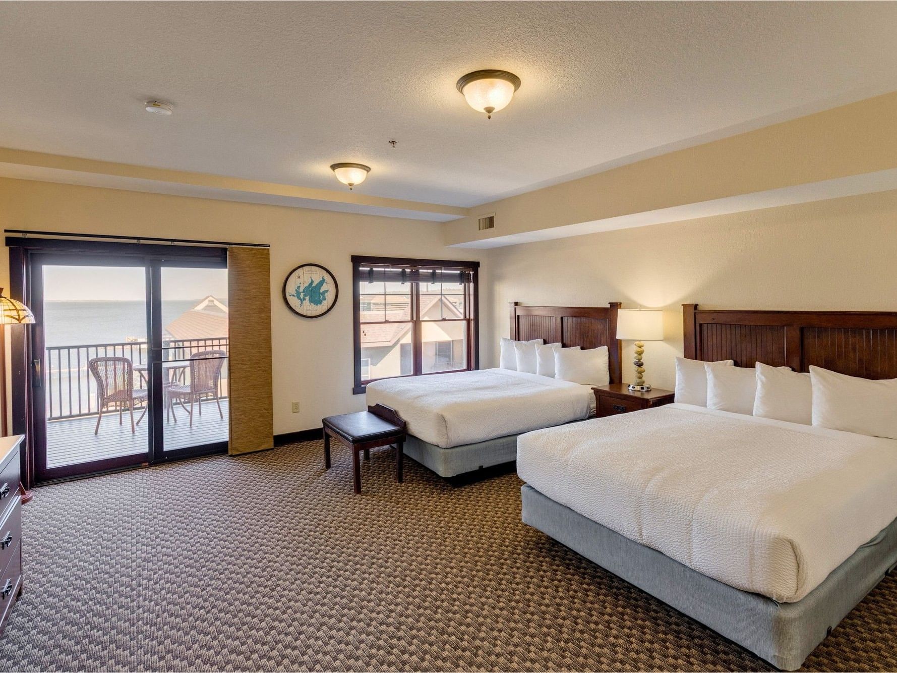 Two beds and balcony with ocean view in Studio Condo at Chase On The Lake in Walker.