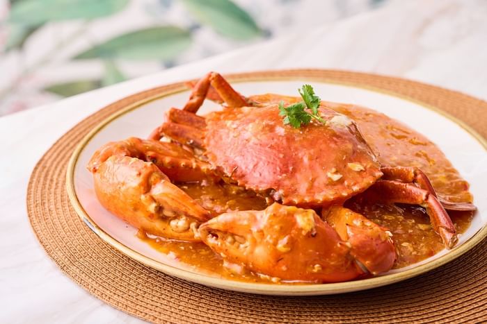Spicy crab dish served on a table in Satay Inn Restaurant at Fullerton Ocean Park Hotel Hong Kong