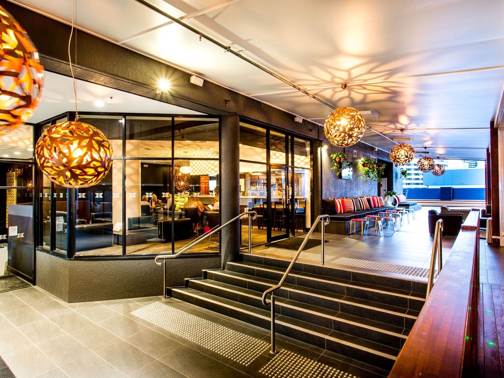 Lounge area in Frescos Courtyard at Grand Chancellor Brisbane