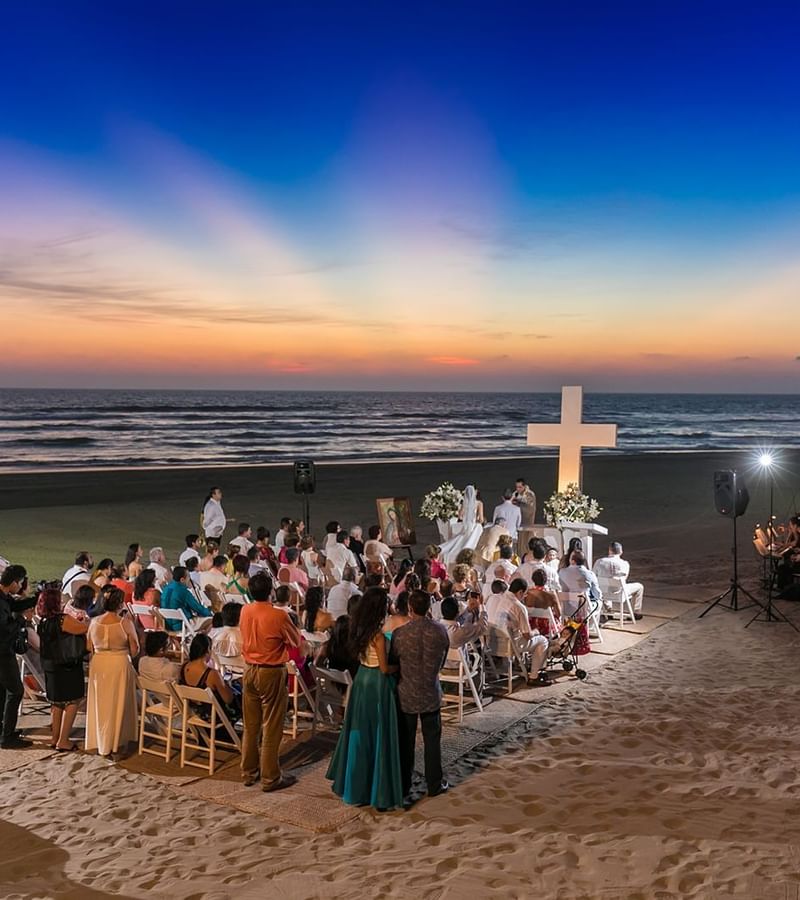 Wedding ceremony by the beach at Pierre Mundo Imperial