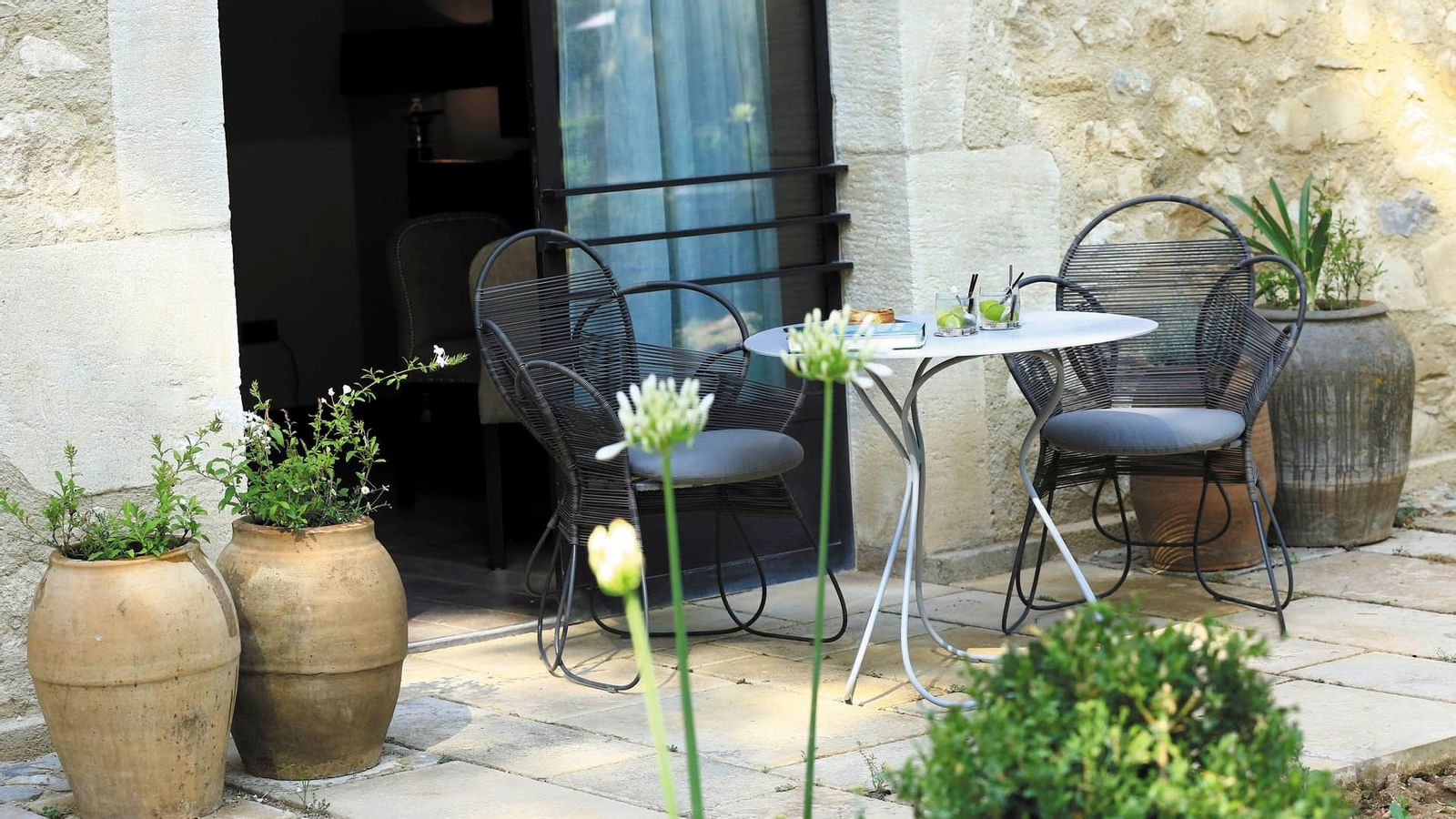 Outdoor seating patio next to Junior Suite, Domaine de Manville