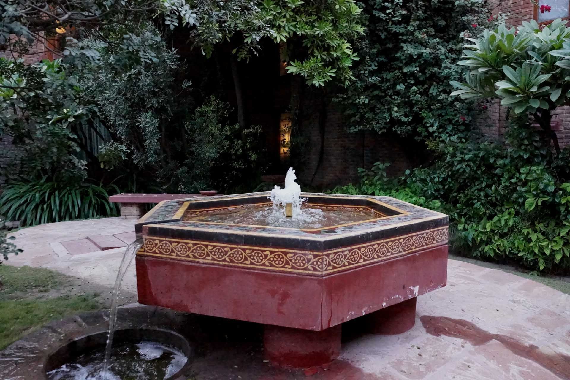 A Fountain in the garden at Faisalabad Serena Hotel