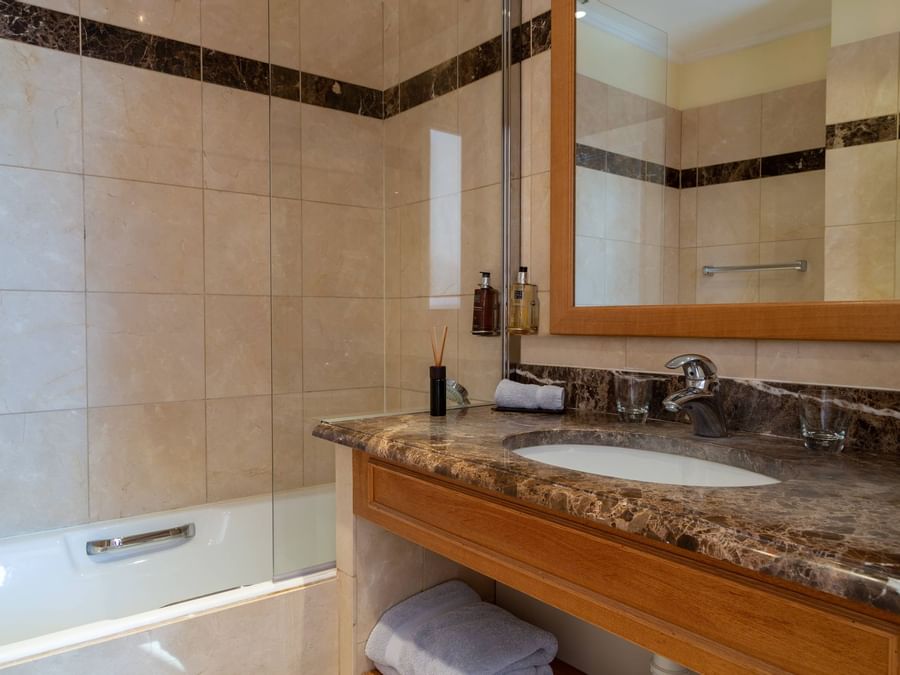 Bathroom vanity in bedrooms at Hotel Saint-Laurent