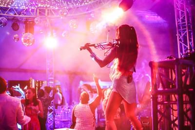 Performer performing at an Event in Morgan Resort Spa Village