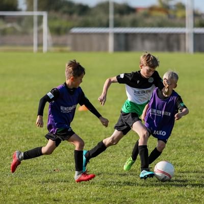 Kids playing at a Football Camp at Falkensteiner Hotels