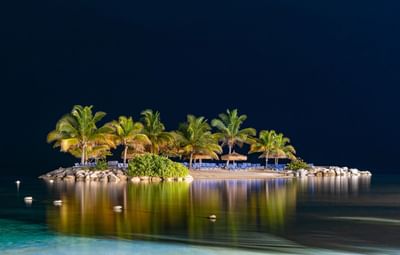 An Island lit up at night near Holiday Inn Montego Bay
