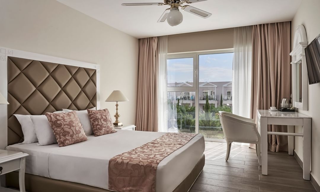 Superior Pool View Room with a King bed at Kairaba Sandy Villas