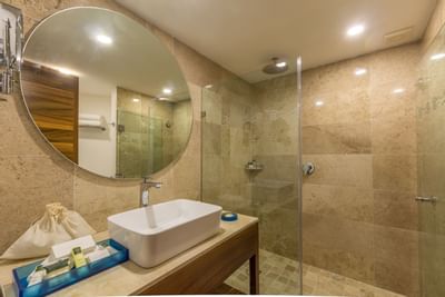 Shower & sink in a bathroom at Buenaventura Grand Hotel