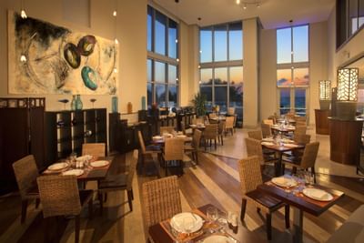 Dining tables in Piacere Restaurant at Marenas Resort Miami