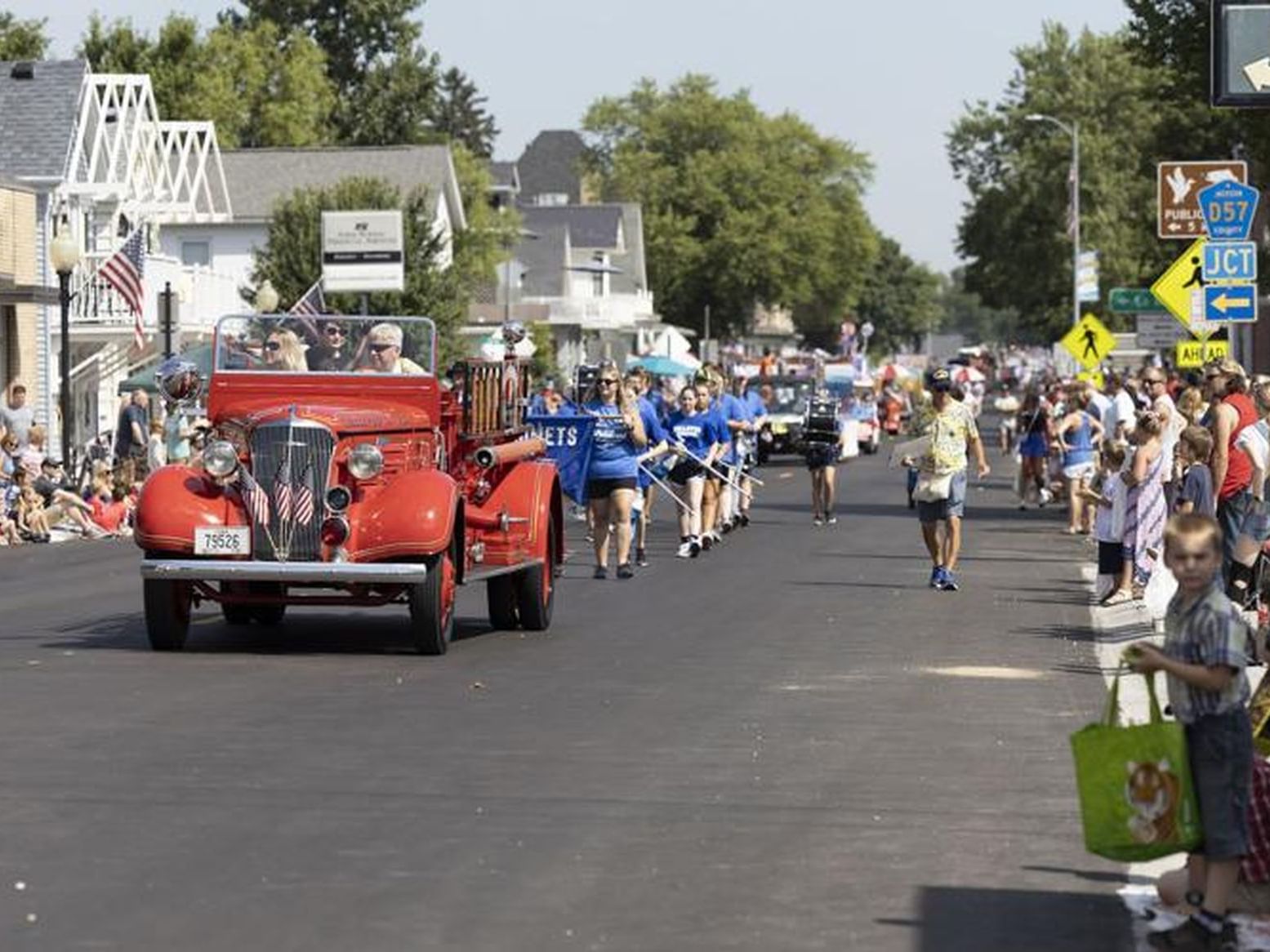 Vintage red fire truck leading the annual Fourth of July parade near Off Shore Resort