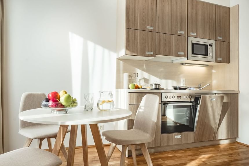 Dining area in Apartments Suite at Oliver Like Home