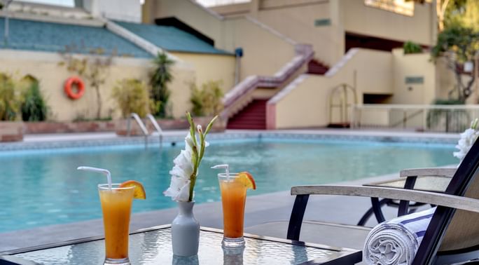 Orange juices served by the pool at Peshawar Serena Hotel
