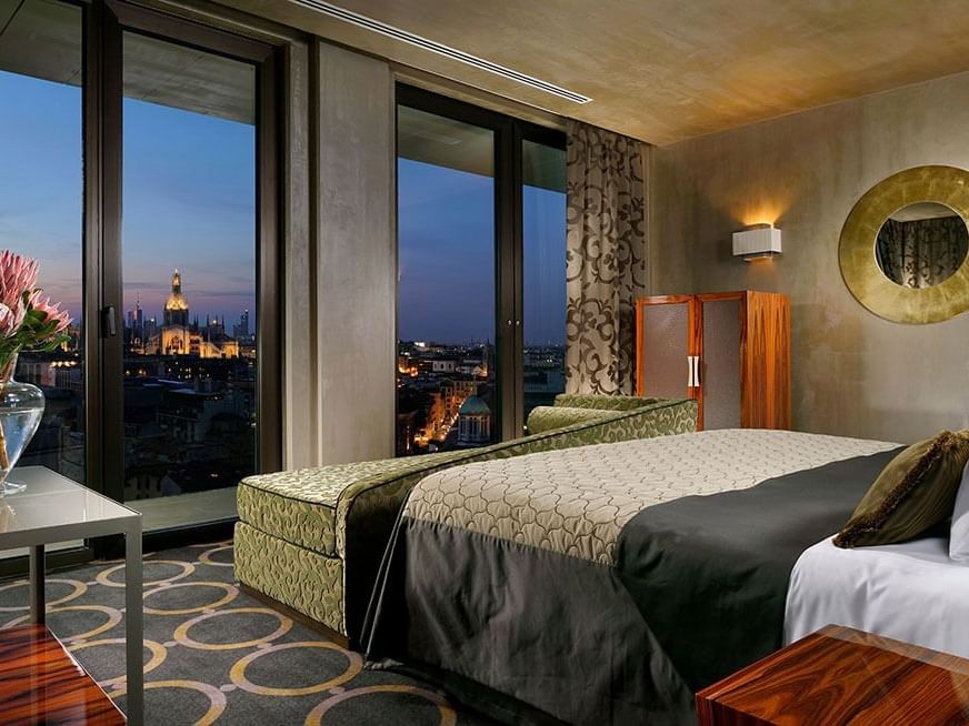 Bedroom with city view in Presidential Suite at Uptown Palace