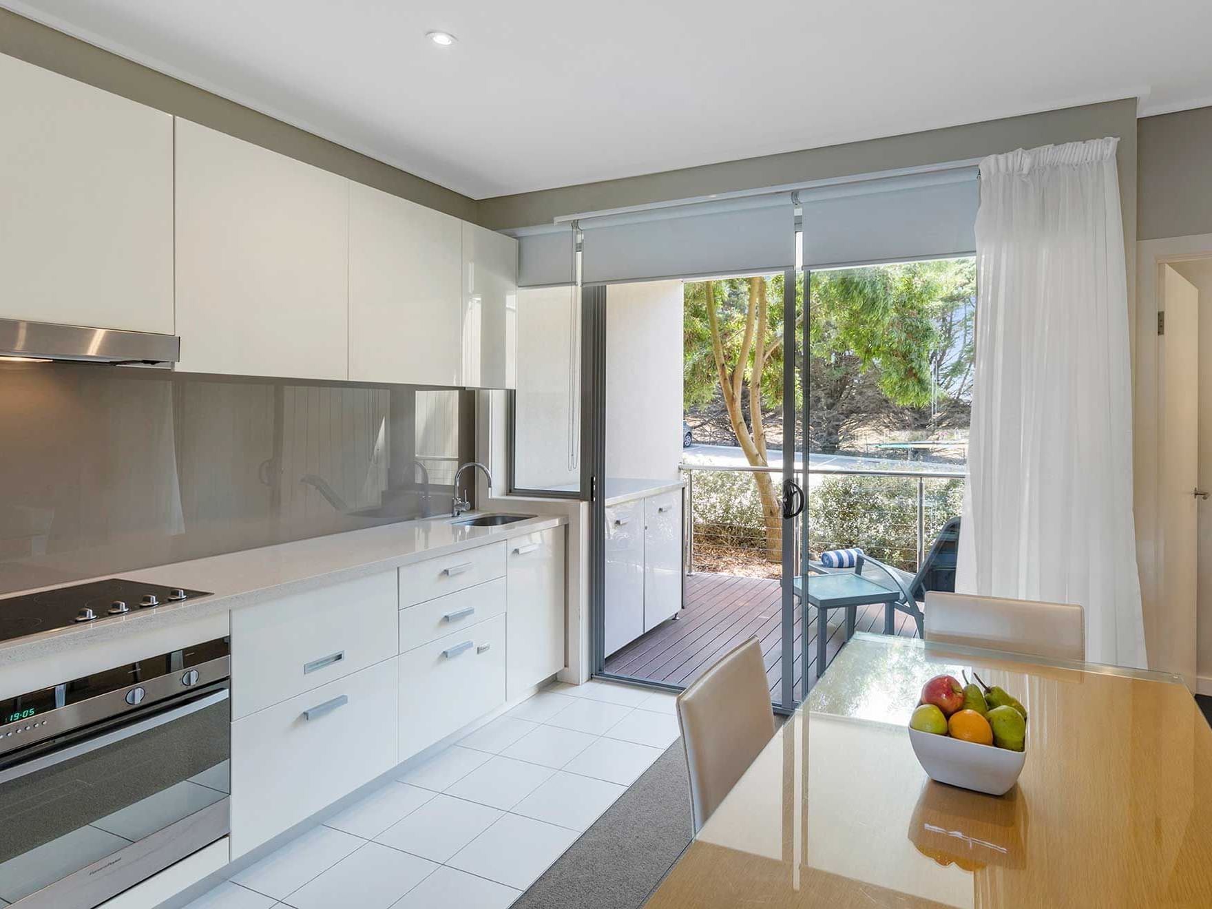 A chef's kitchen in 1 Bedroom Apartments at Silverwater Resort