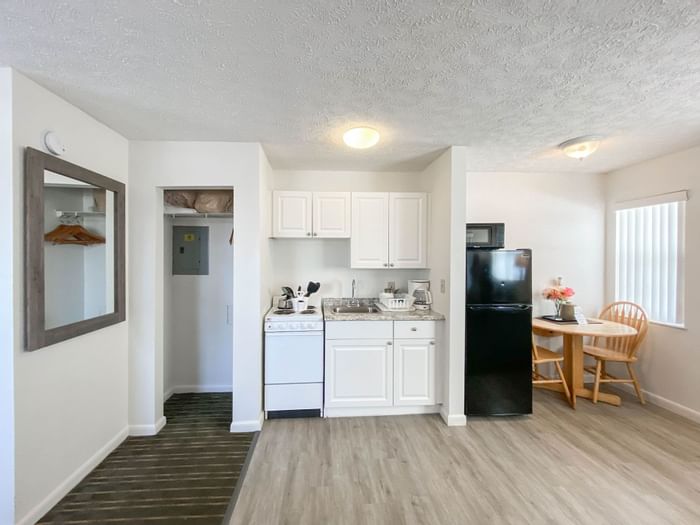 Living room & Kitchen area in a room at Ocean Court Beachfront