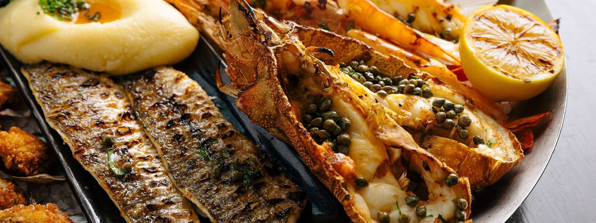 Seafood platter with lobster, fish, and scallops served in The Atlantic Restaurant at Crown Hotel Melbourne