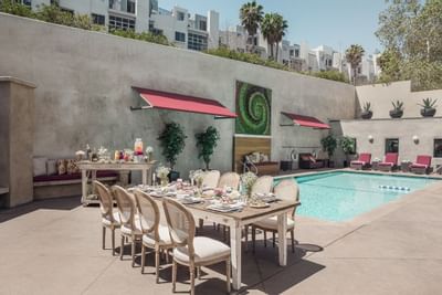 Arranged tables in Angeleno Pool Terrace at Hotel Angeleno