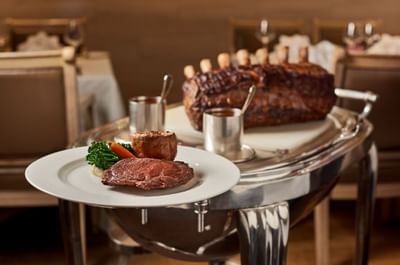 Grilled meat on a serving trolley at Goodwood Park Hotel