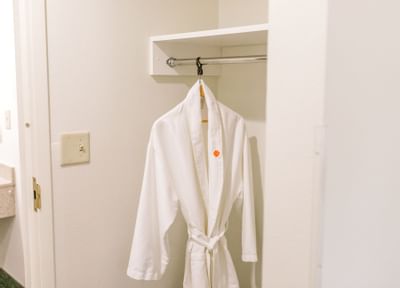 robe with orange logo on it