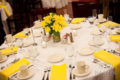Round table set with yellow accents