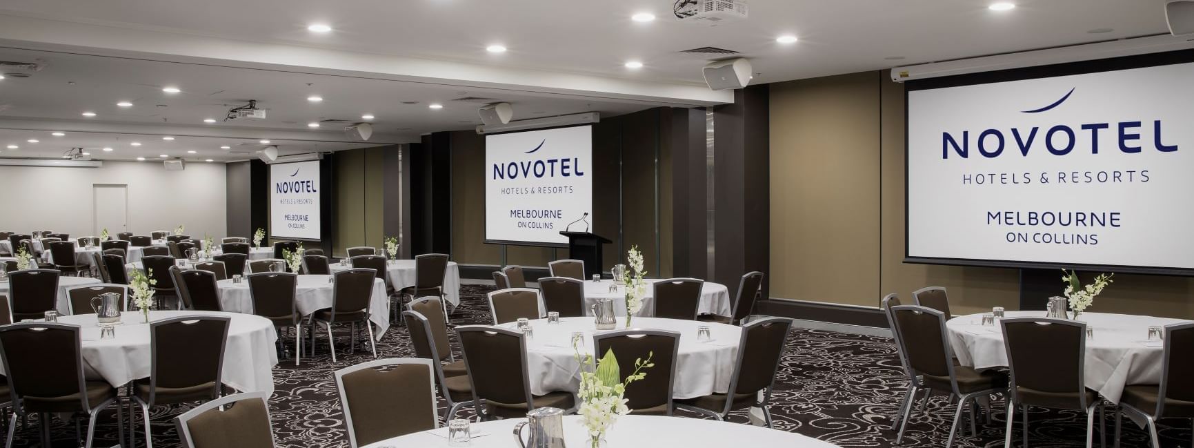 Banquet tables setup in Australian Room  at Novotel Melbourne