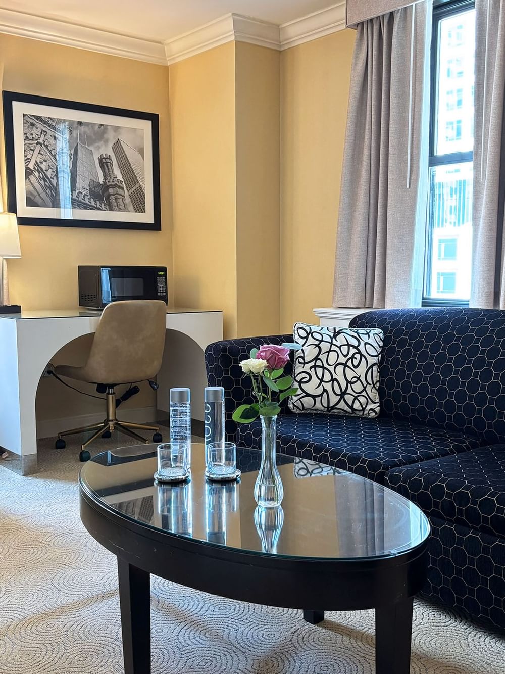Elegant Superior Suite with lounge area and office space at Warwick Allerton Chicago.