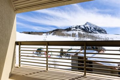 A balcony with an amazing view of the Crested Butte Mountains from the Elevation Hotel Resort & Spa