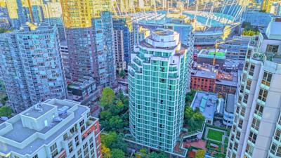Aerial view of Rosedale on Robson Suite Hotel with city towers and BC Place Stadium in the background