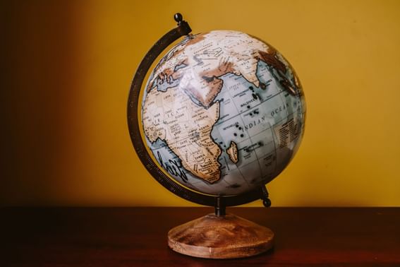 Close-up of a globe on a table at Ruby Foo's Hotel