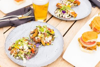 Meals & beer served in Topside Terrace Kitchen & Bar at Hotel Republic San Diego