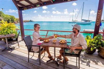 Couple in Dodgy Dock Restaurant & Bar at True Blue Bay Hotel