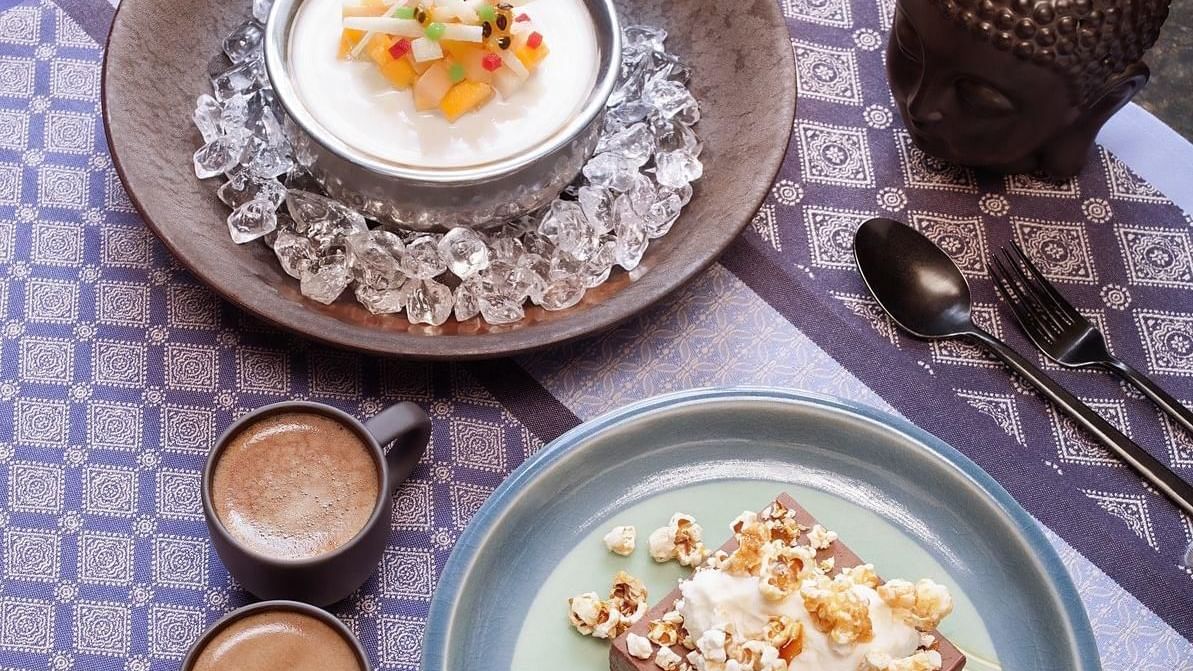 Close-up of Desserts & two espressos at Spice Market