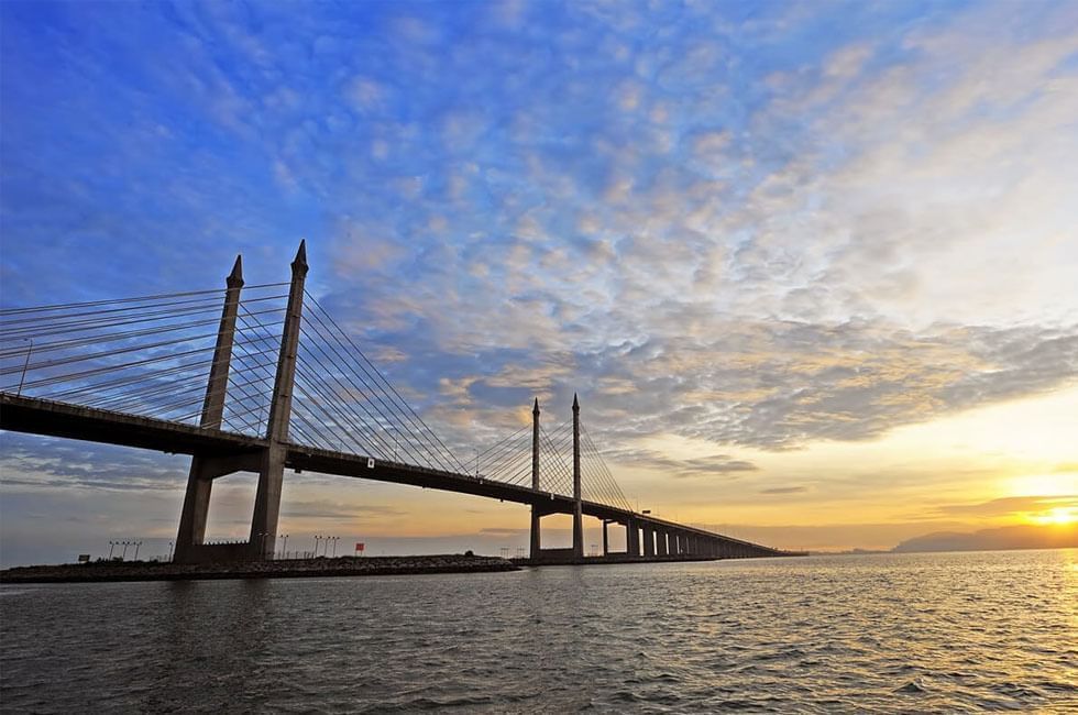 Distant view of Penang Bridge at sunrise near Sunway Hotel Seberang Jaya